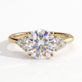 Round lab-grown diamond halo engagement ring in 14K (585) yellow gold, front view 
