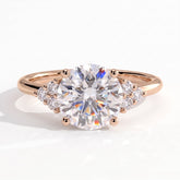 Round lab-grown diamond halo engagement ring in 14K (585) rose gold, front view 