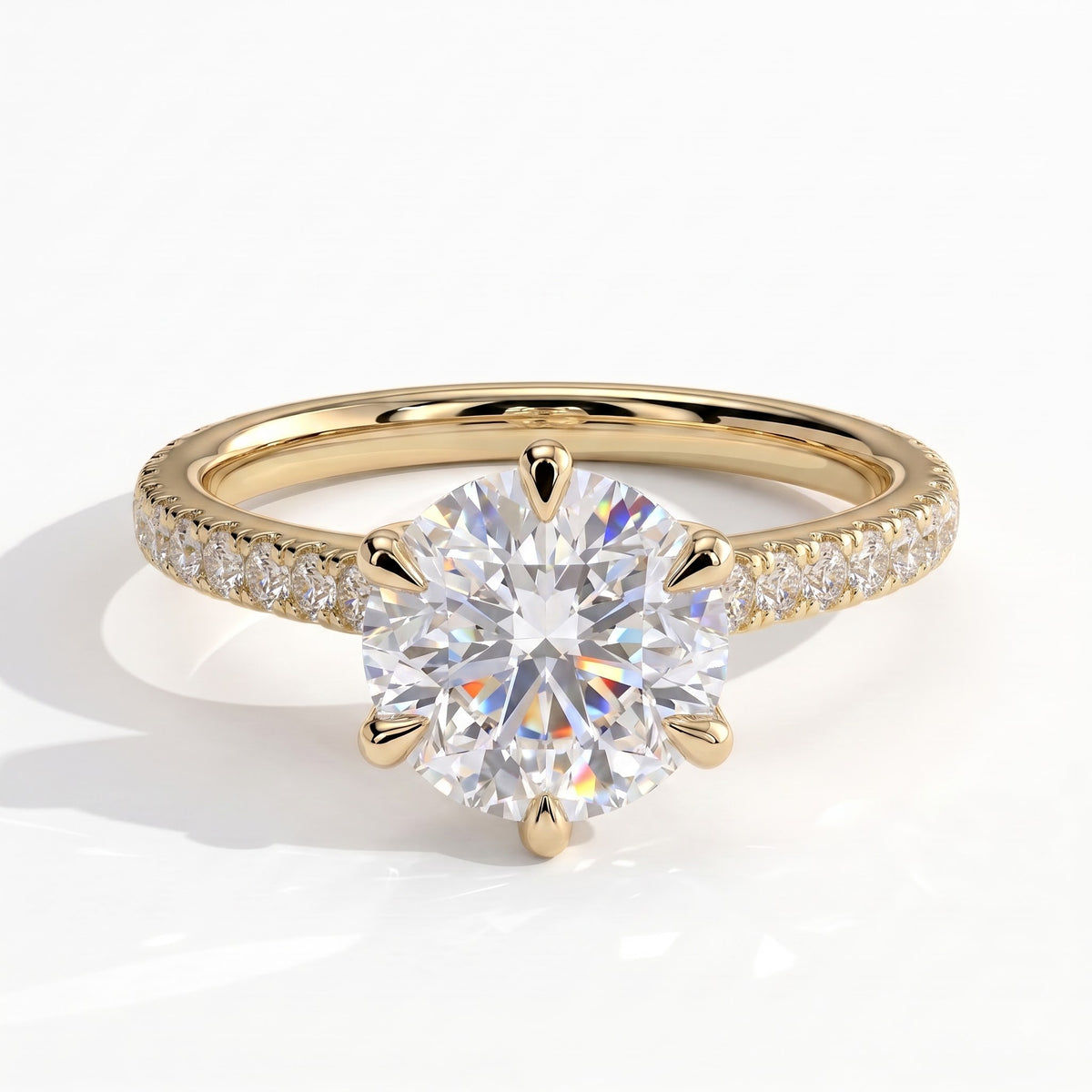 Round lab-grown diamond halo engagement ring in 14K (585) yellow gold, front view 
