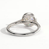 Round lab-grown diamond bezel-set solitaire engagement ring in 14K (585) white gold, on white background 