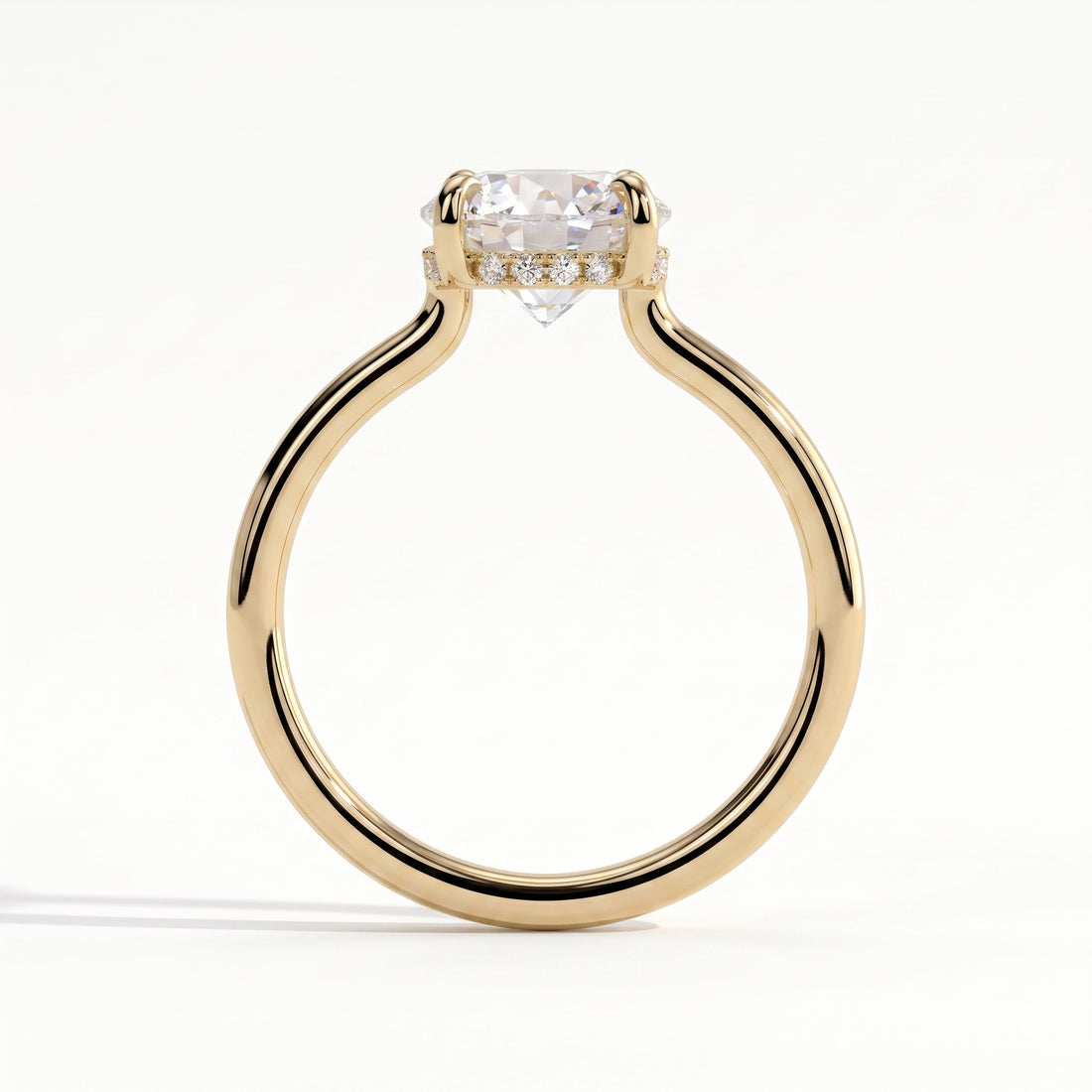 Round lab-grown diamond solitaire engagement ring in 14K (585) yellow gold, side profile 