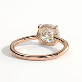 Round lab-grown diamond solitaire engagement ring in 14K (585) rose gold, on white background 