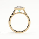 Round lab-grown diamond bezel-set solitaire engagement ring in 18K (750) yellow gold, side profile 