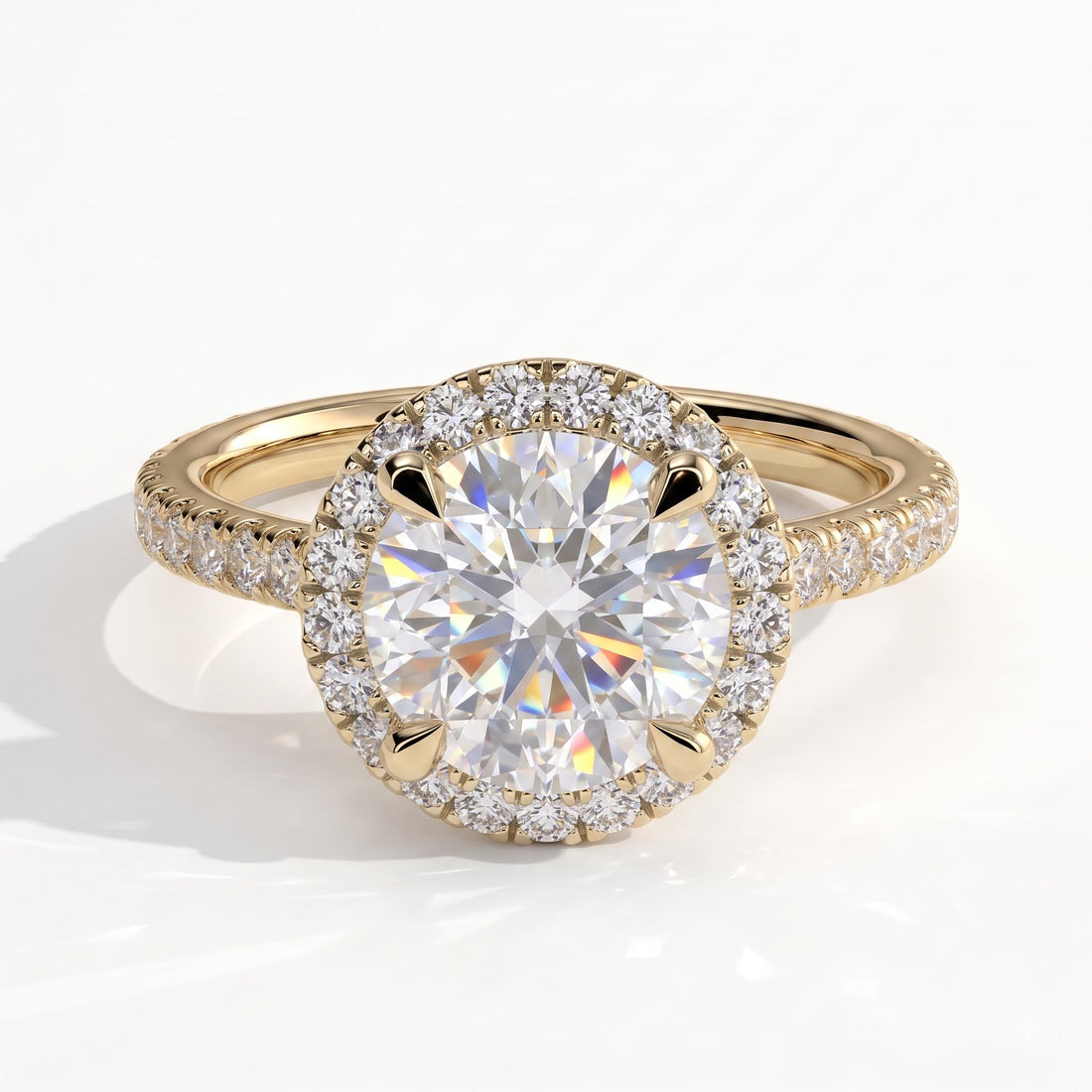 Round lab-grown diamond halo engagement ring in 14K (585) yellow gold, front view 