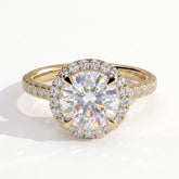 Round lab-grown diamond halo engagement ring in 14K (585) yellow gold, front view 