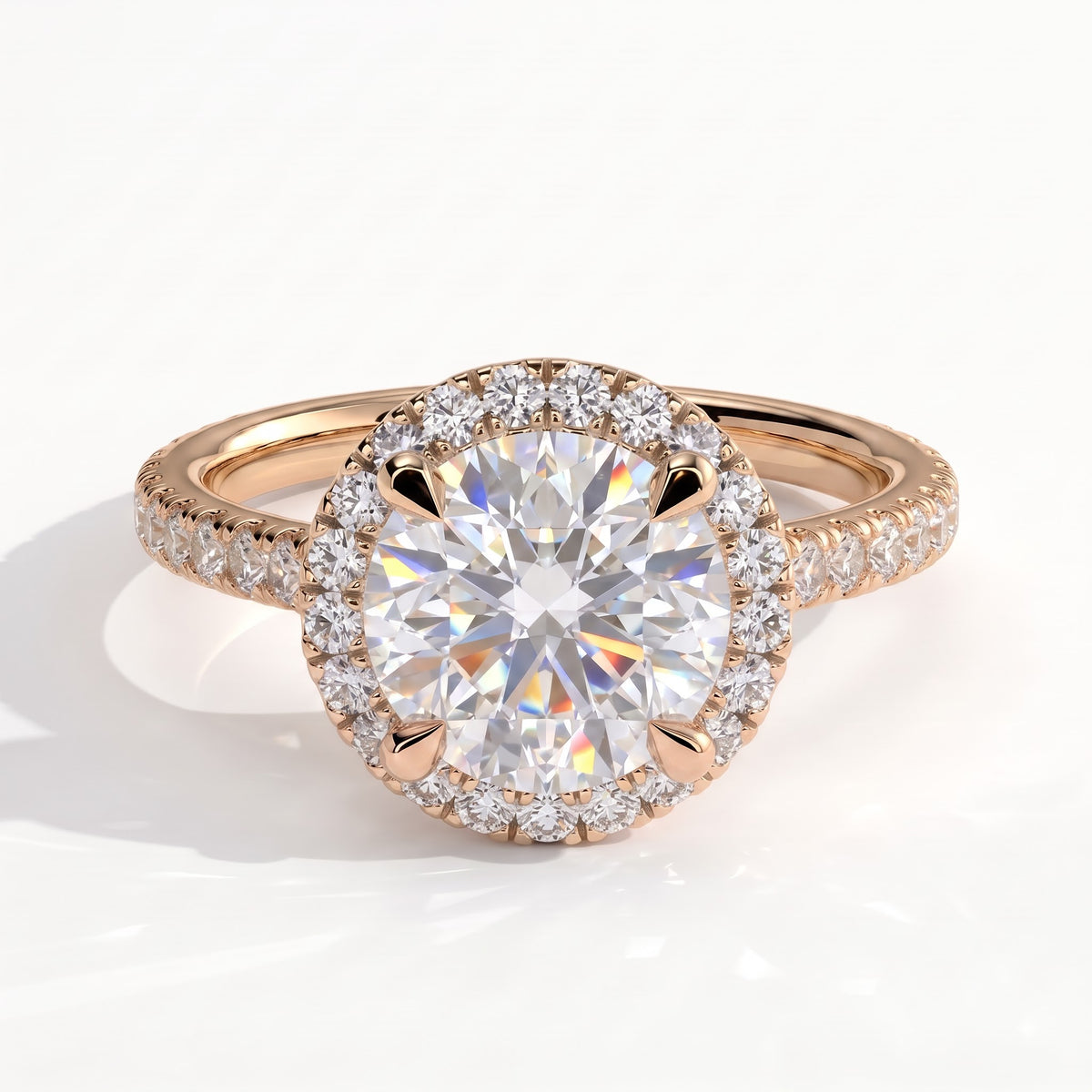 Round lab-grown diamond halo engagement ring in 14K (585) rose gold, front view 