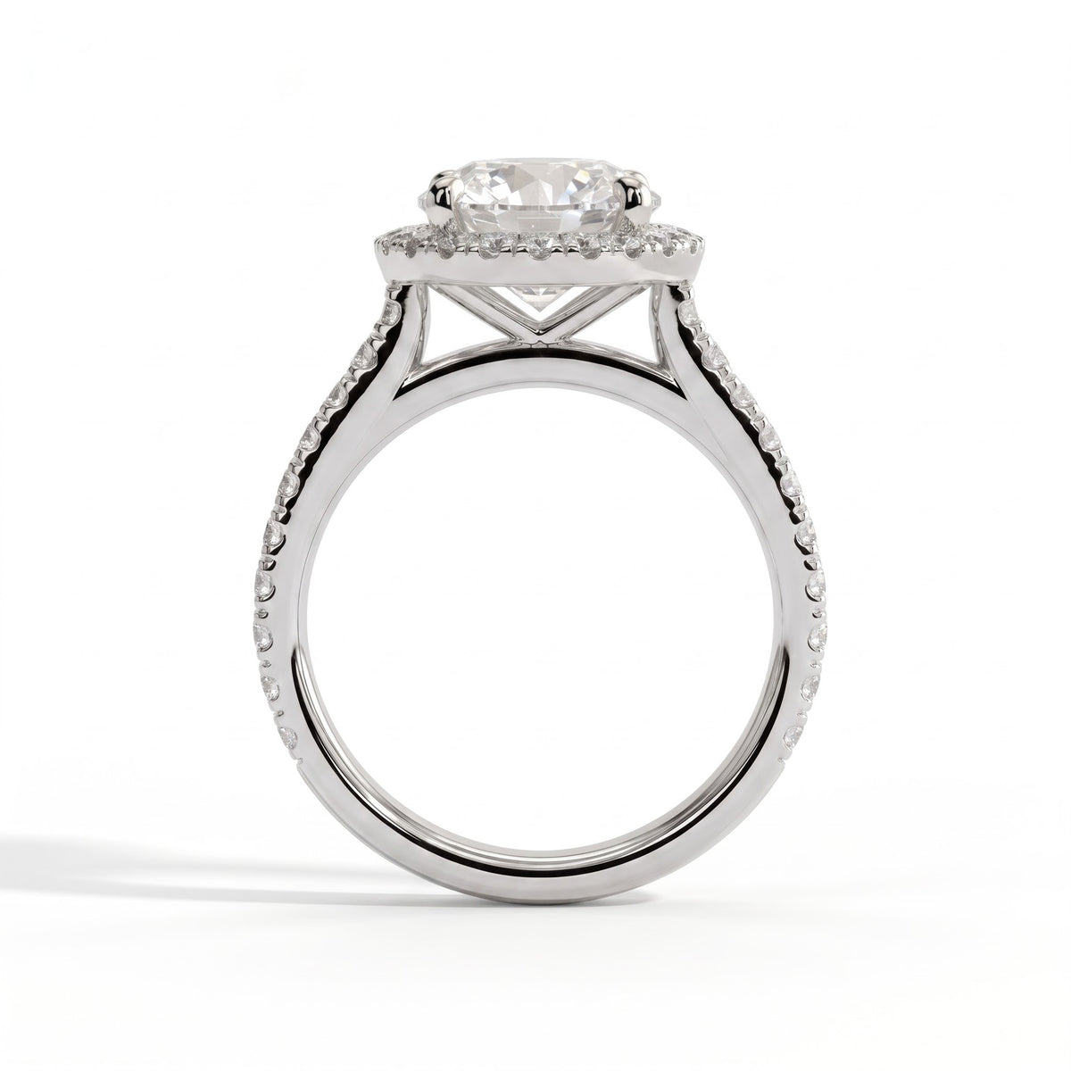 Round lab-grown diamond halo engagement ring in 950 platinum, side profile 