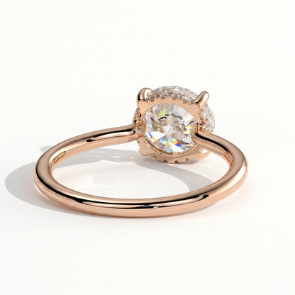 Round lab-grown diamond solitaire engagement ring in 18K (750) rose gold, on white background 
