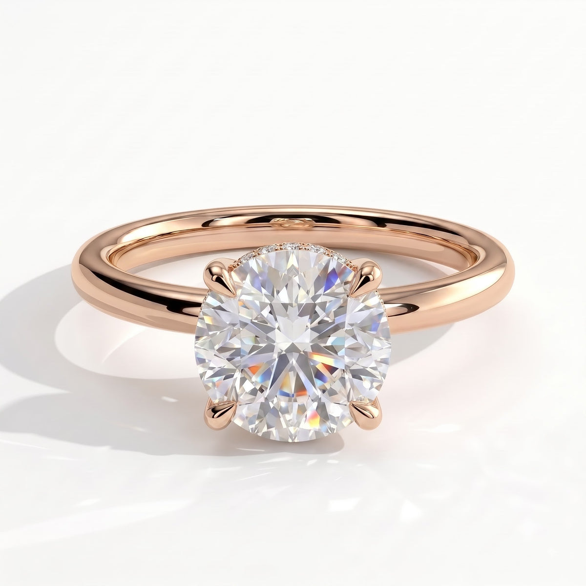 Round lab-grown diamond solitaire engagement ring in 18K (750) rose gold, front view 