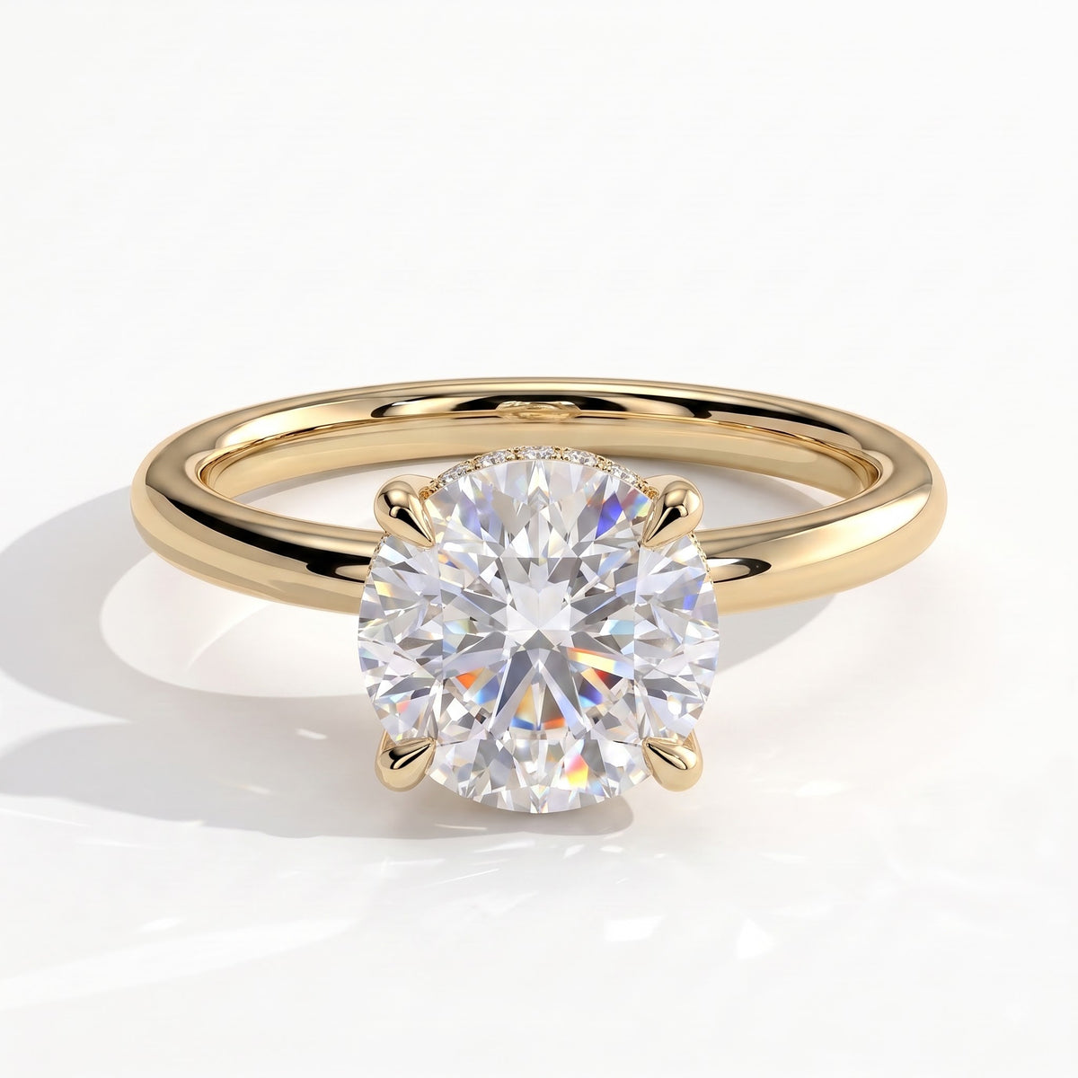 Round lab-grown diamond solitaire engagement ring in 18K (750) yellow gold, front view 