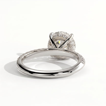 Round lab-grown diamond halo engagement ring in 18K (750) white gold, on white background 