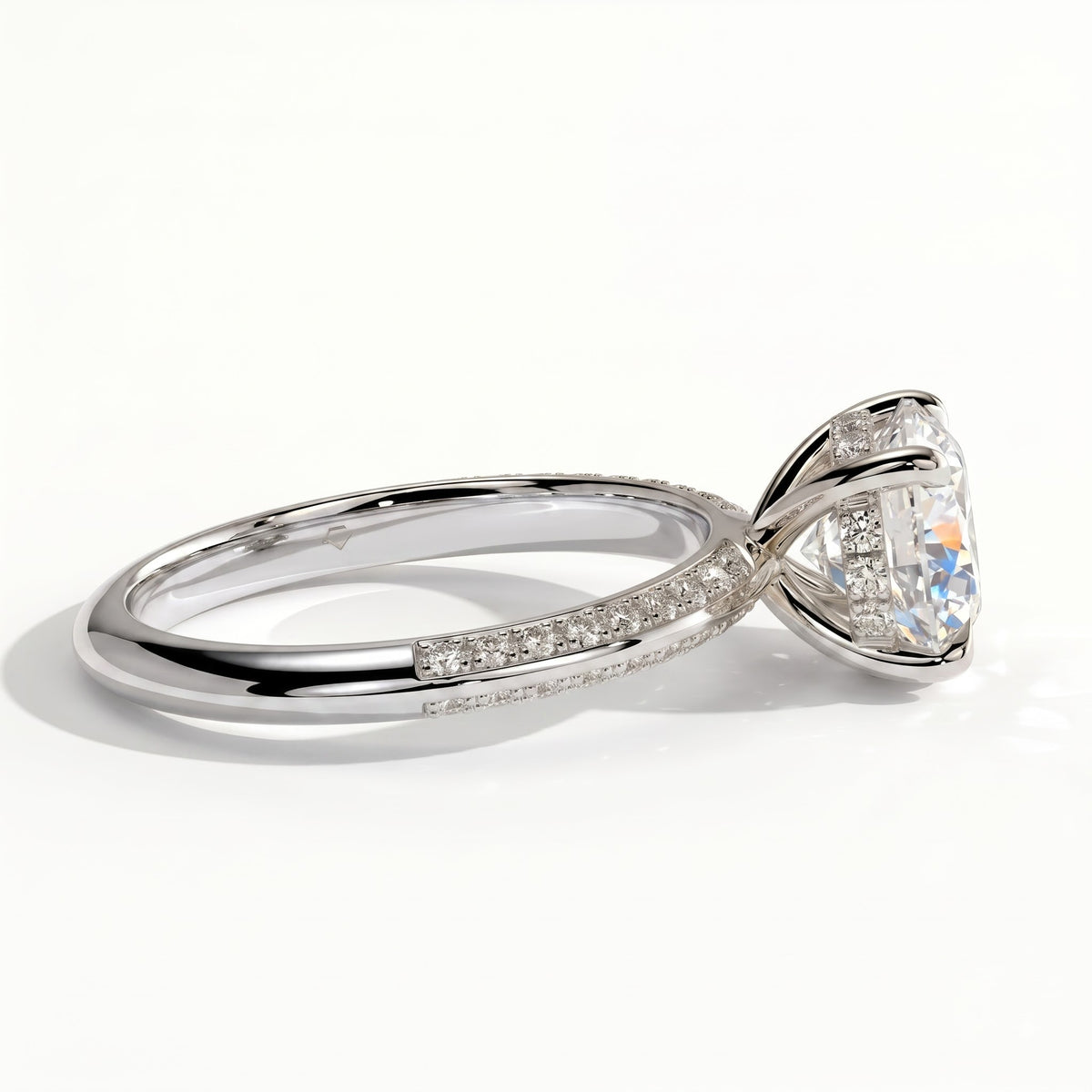 Round lab-grown diamond halo engagement ring in 950 platinum, front view 