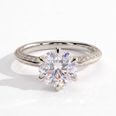 Round lab-grown diamond halo engagement ring in 950 platinum, on white background 