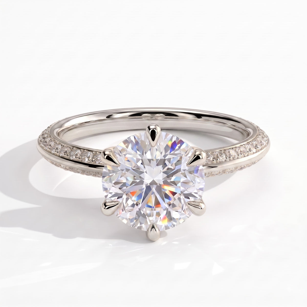 Round lab-grown diamond halo engagement ring in 950 platinum, on white background 