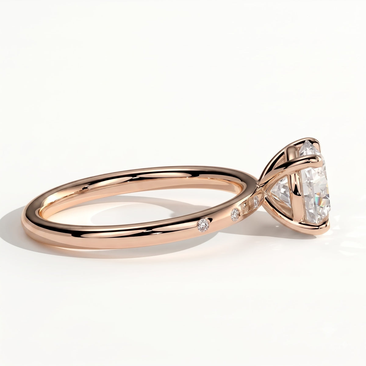 Round lab-grown diamond halo engagement ring in 18K (750) rose gold, detail view 