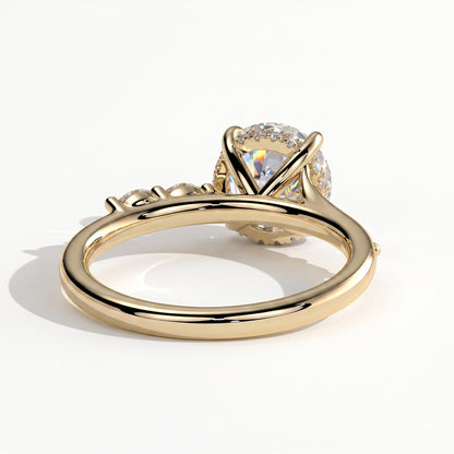 Round lab-grown diamond halo engagement ring in 14K (585) yellow gold, on white background 