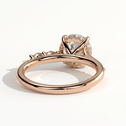 Round lab-grown diamond halo engagement ring in 14K (585) rose gold, on white background 