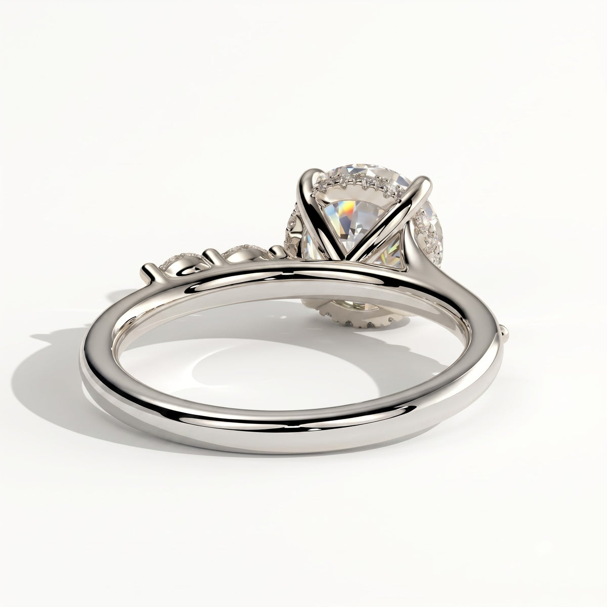 Round lab-grown diamond halo engagement ring in 14K (585) white gold, on white background 