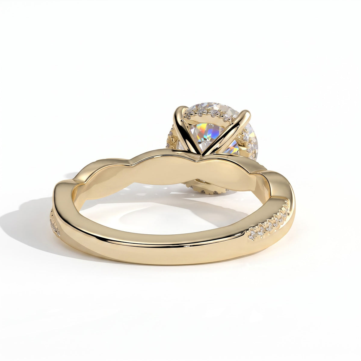 Round lab-grown diamond halo engagement ring in 14K (585) yellow gold, on white background 