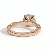 Round lab-grown diamond halo engagement ring in 18K (750) rose gold, on white background 