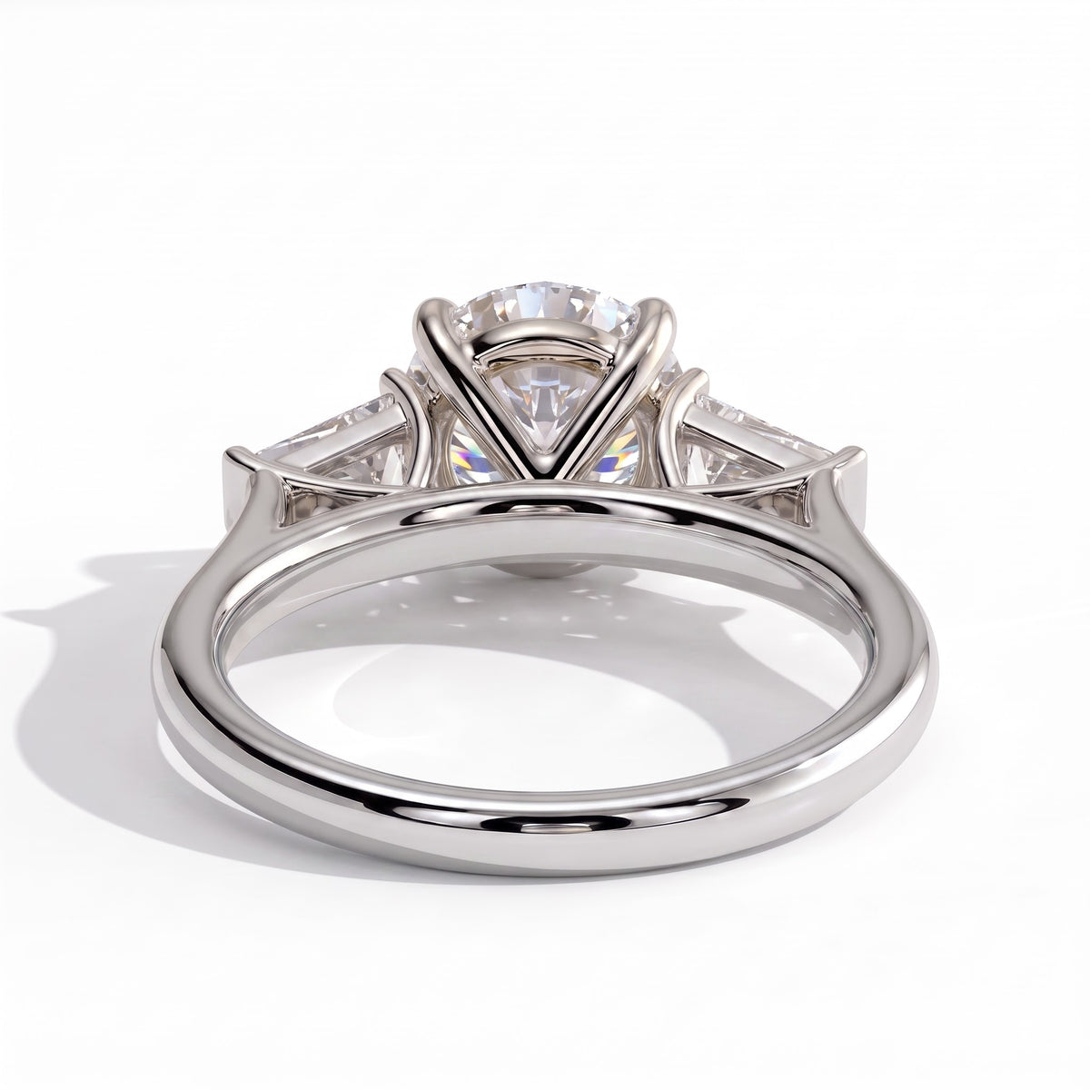 Round lab-grown diamond three-stone engagement ring in 14K (585) white gold, on white background 