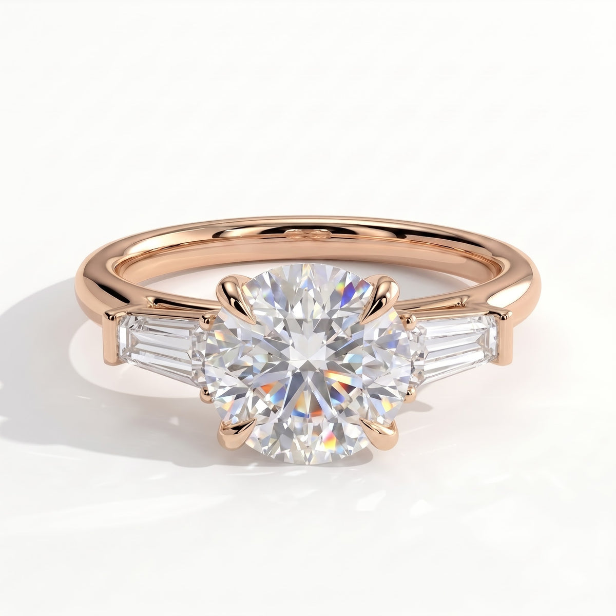 Round lab-grown diamond three-stone engagement ring in 14K (585) rose gold, front view 