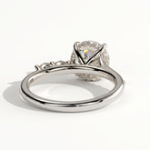 Round lab-grown diamond halo engagement ring in 950 platinum, on white background 