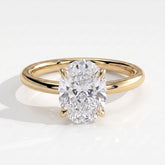 Oval lab-grown diamond solitaire engagement ring in 14K (585) yellow gold, front view 