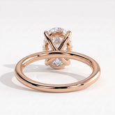 Oval lab-grown diamond solitaire engagement ring in 14K (585) rose gold, on white background 