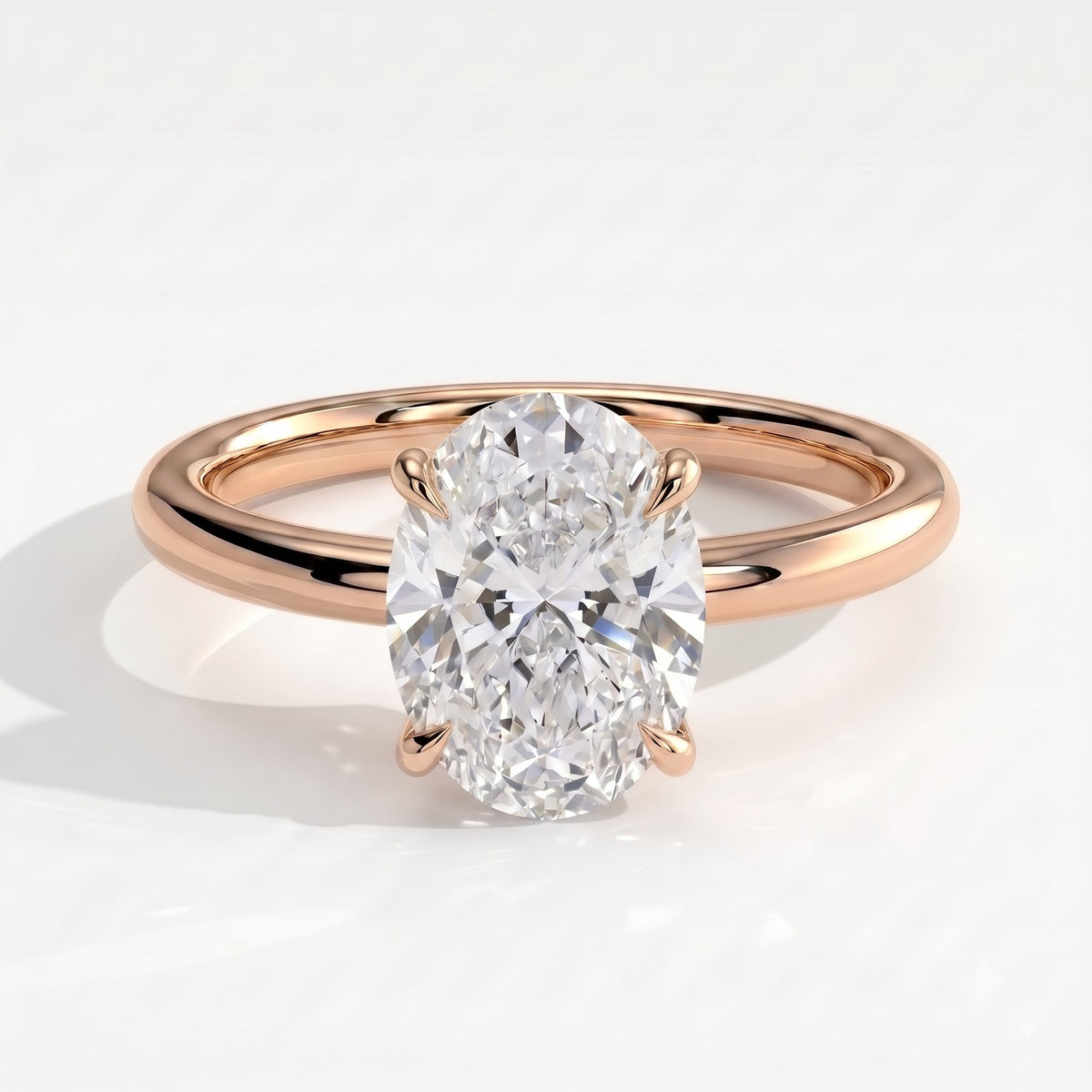 Oval lab-grown diamond solitaire engagement ring in 14K (585) rose gold, front view 
