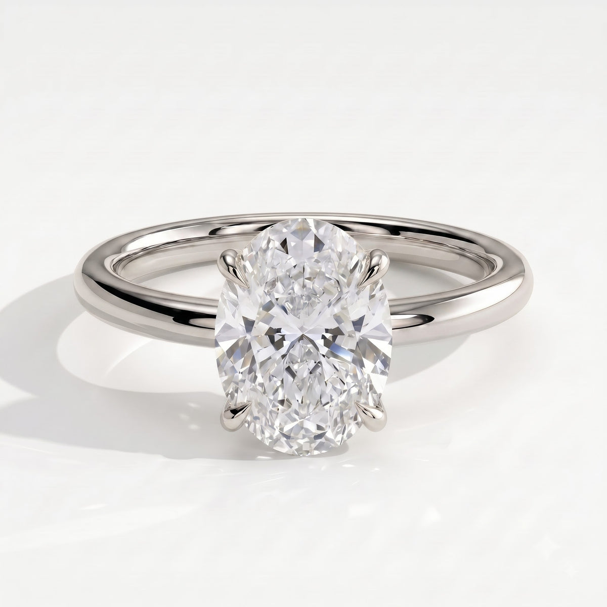 Oval lab-grown diamond solitaire engagement ring in 14K (585) white gold, front view 