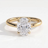 Oval lab-grown diamond solitaire engagement ring in 14K (585) yellow gold, front view 