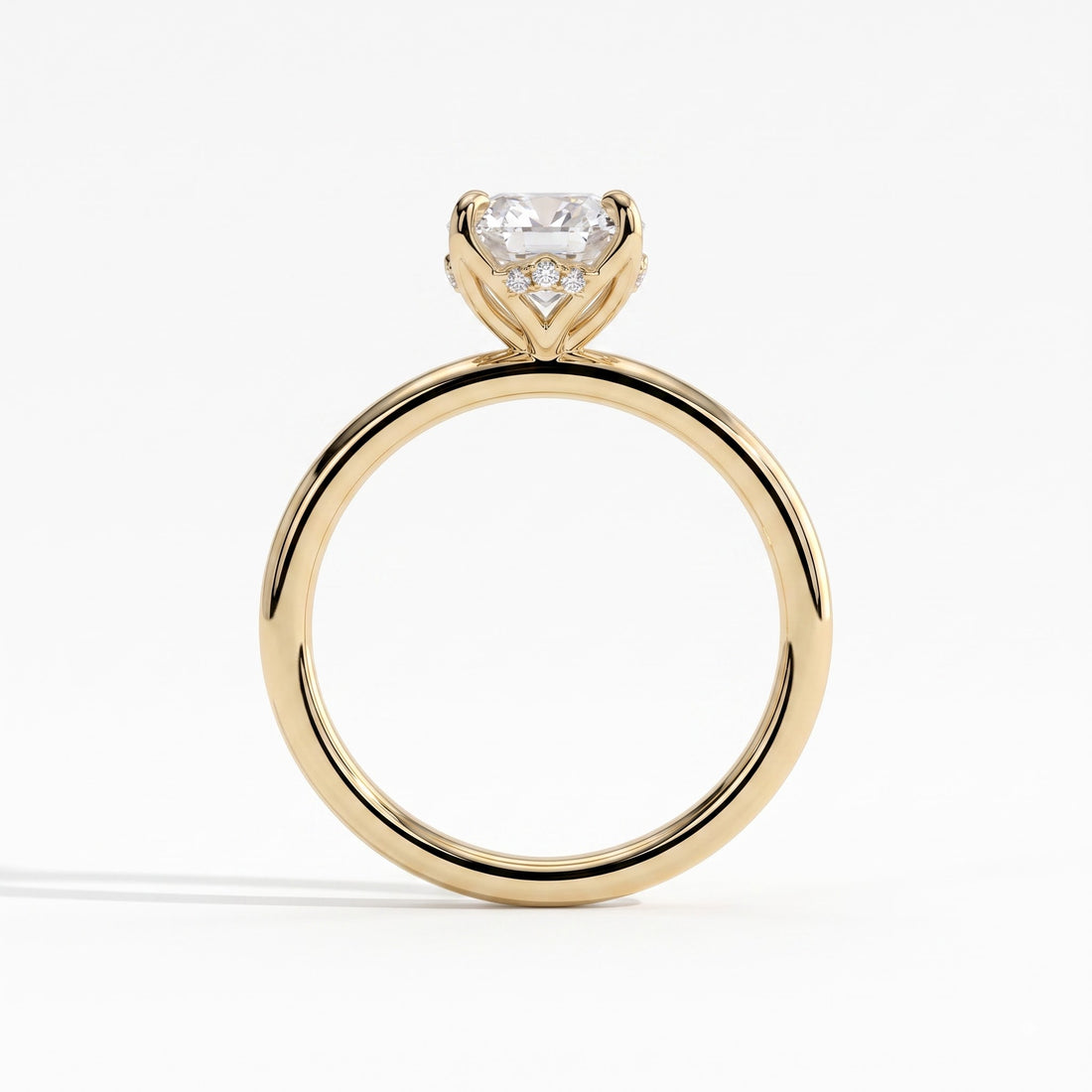 Oval lab-grown diamond solitaire engagement ring in 14K (585) yellow gold, side profile 