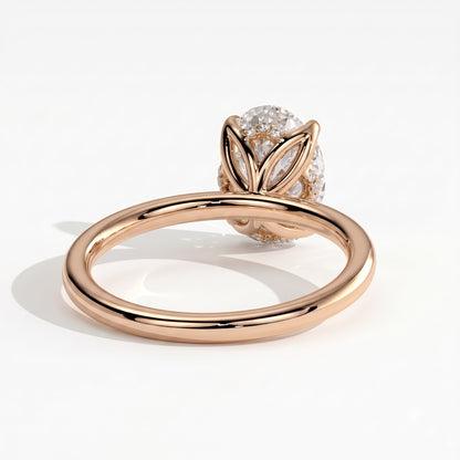 Oval lab-grown diamond solitaire engagement ring in 14K (585) rose gold, on white background 