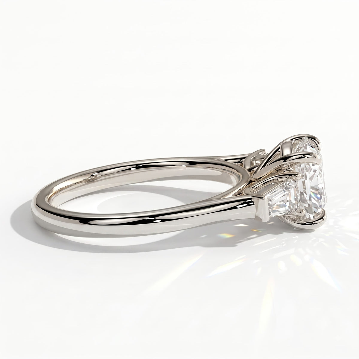 Round lab-grown diamond three-stone engagement ring in 950 platinum, detail view 