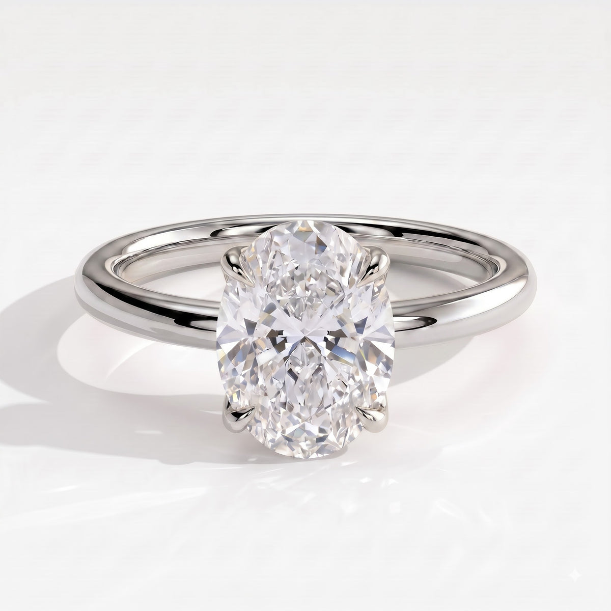 Oval lab-grown diamond solitaire engagement ring in 18K (750) white gold, front view 