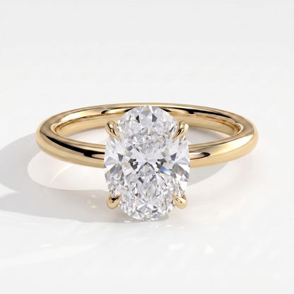 Oval lab-grown diamond solitaire engagement ring in 18K (750) yellow gold, front view 