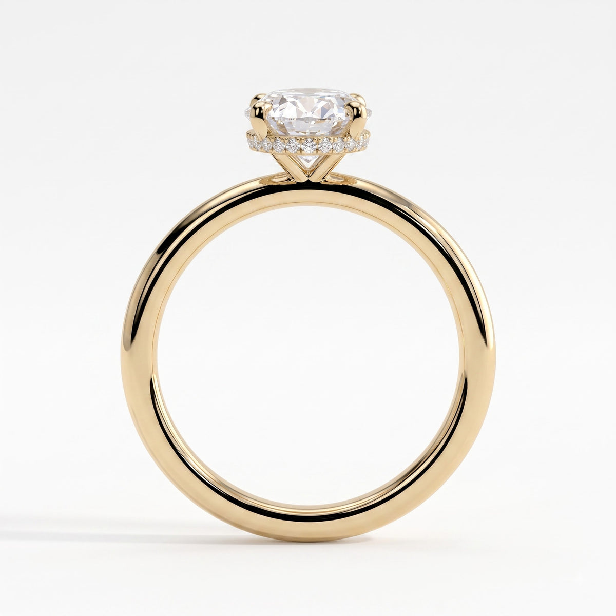 Oval lab-grown diamond solitaire engagement ring in 14K (585) yellow gold, side profile 