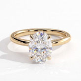 Oval lab-grown diamond solitaire engagement ring in 14K (585) yellow gold, front view 