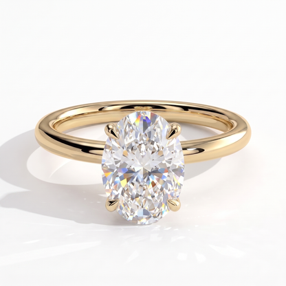 Oval lab-grown diamond solitaire engagement ring in 14K (585) yellow gold, front view 