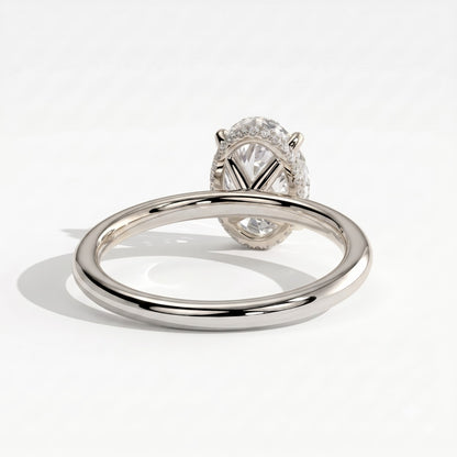 Oval lab-grown diamond solitaire engagement ring in 950 platinum, on white background 