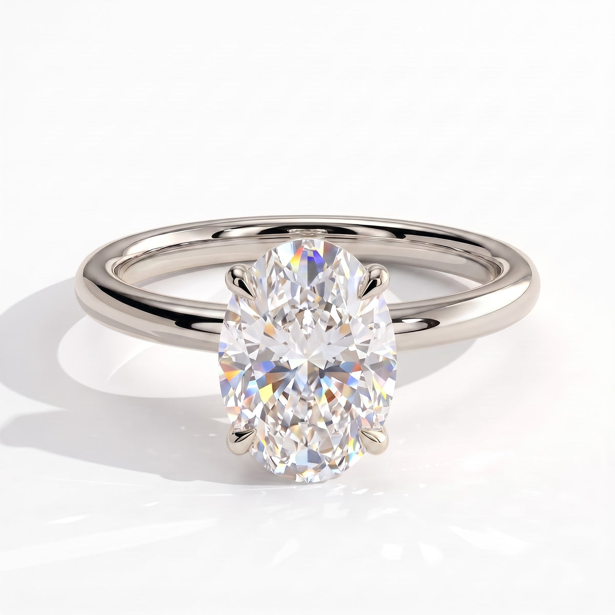 Oval lab-grown diamond solitaire engagement ring in 950 platinum, front view 