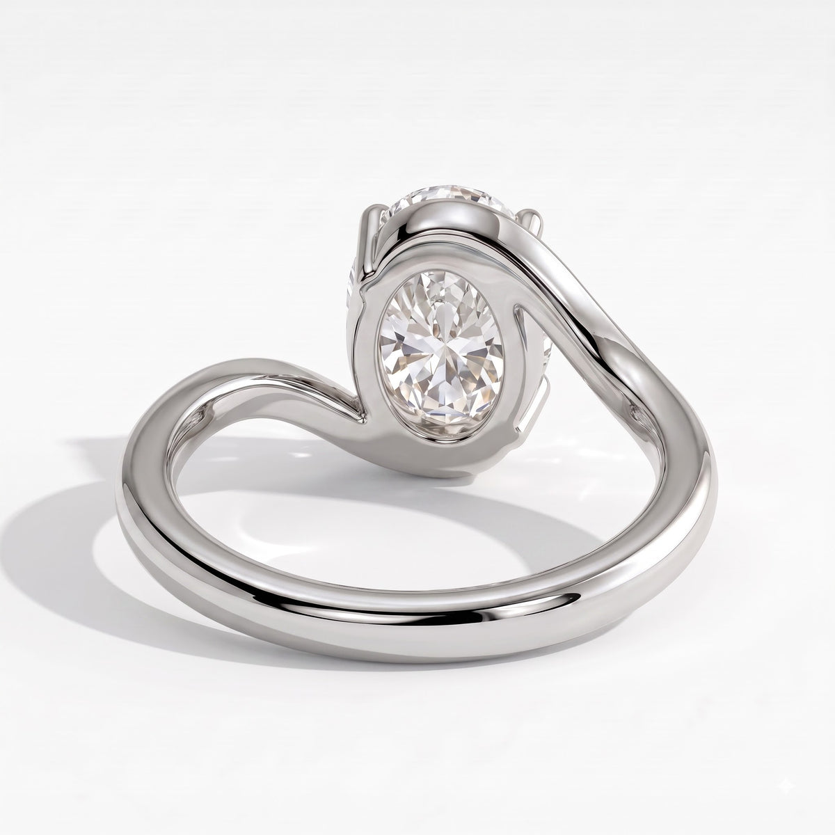 Oval lab-grown diamond solitaire engagement ring in 14K (585) white gold, on white background 