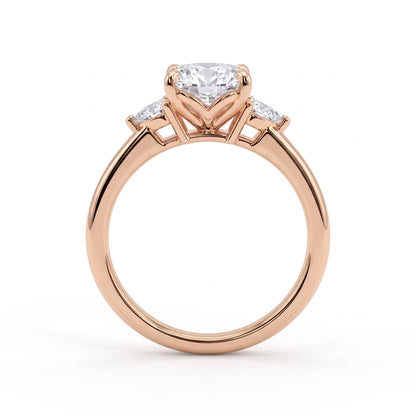 Oval lab-grown diamond three-stone engagement ring in 18K (750) rose gold, side profile 