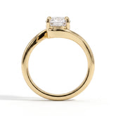 Oval lab-grown diamond solitaire engagement ring in 18K (750) yellow gold, on white background 