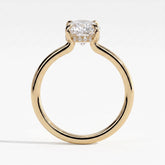 Oval lab-grown diamond solitaire engagement ring in 14K (585) yellow gold, side profile 
