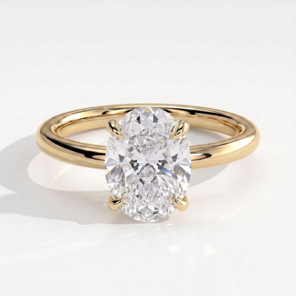 Oval lab-grown diamond solitaire engagement ring in 14K (585) yellow gold, front view 