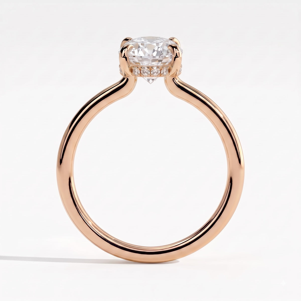 Oval lab-grown diamond solitaire engagement ring in 14K (585) rose gold, side profile 