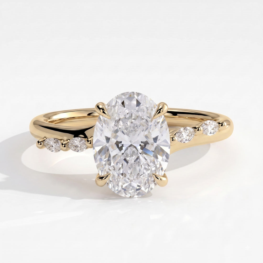 Oval lab-grown diamond halo engagement ring in 14K (585) yellow gold, front view 
