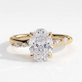 Oval lab-grown diamond halo engagement ring in 14K (585) yellow gold, front view 